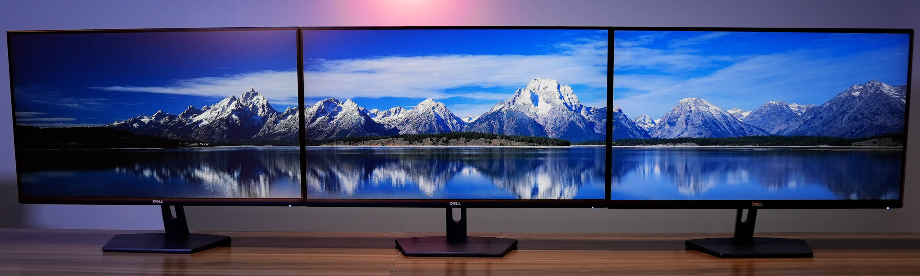 optisigns three screen video wall displaying mountains and a lake