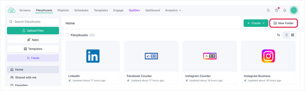 OptiSigns – Fichiers/Ressources avec le bouton Nouveau dossier mis en évidence en haut à droite