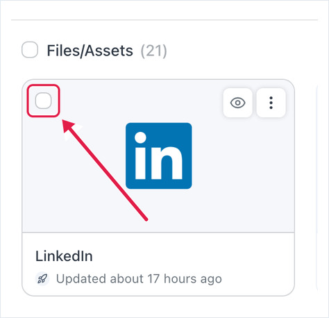 The tick box that appears in the top-left corner of an asset card when you hover over it