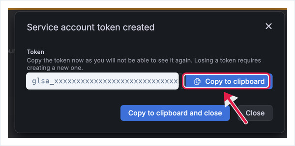 Grafana token created dialog with the token value and Copy to clipboard highlighted