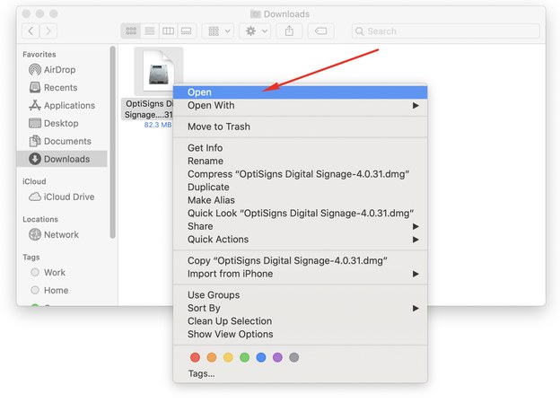 Downloads folder in Finder with the OptiSigns Digital Signage disk image and Open selected